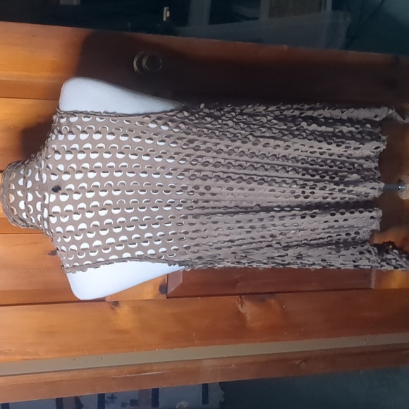 J. JANET* fun funky asymmetrical 'hole-y' vest in a neutral taupe colour - Picture 5 of 10